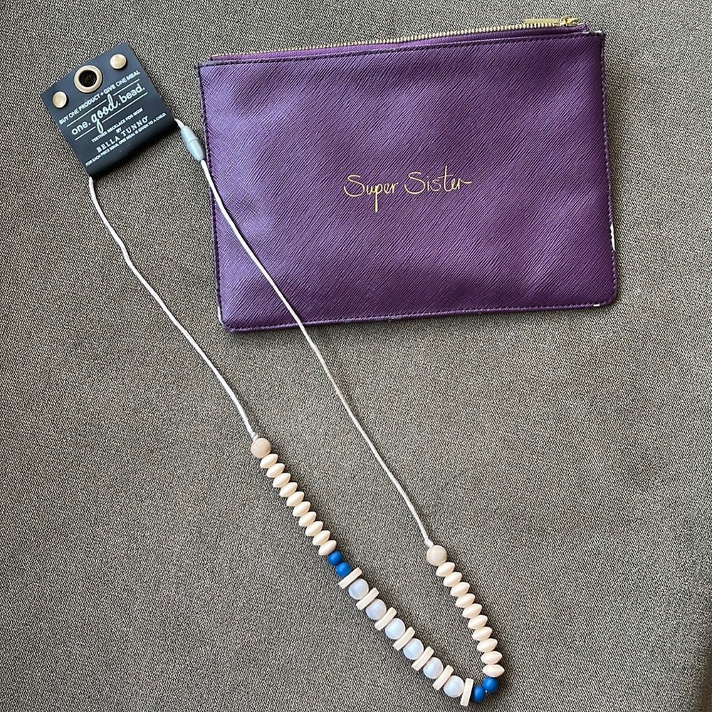 Tether necklace for mom. New never used, with tags. Including a carrying pouch